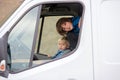 Sweet toddler boy, looking through window of car, enjoying the view of nature Royalty Free Stock Photo