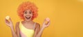 sweet tooth. funny kid in clown wig hold french macaron. amazed child wear swimsuit. Teenager child with sweets, poster Royalty Free Stock Photo