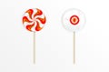 Sweet candies twisted lollipop with Halloween striped pattern and eye on wooden sticks isolated on white background