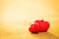 Sweet two heart on sand beach warm light