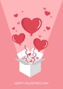 Sweet valentine`s day heart balloon box exploding on pink background