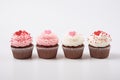 Sweet valentines day cupcakes on white background