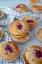 Sweet vanilla raspberry muffins on a table