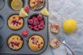 Sweet vanilla raspberry muffins on a table Royalty Free Stock Photo