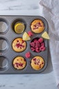 Sweet vanilla raspberry muffins on a table Royalty Free Stock Photo