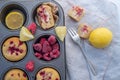 Sweet vanilla raspberry muffins on a table Royalty Free Stock Photo