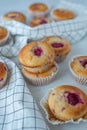 Sweet vanilla raspberry muffins on a table Royalty Free Stock Photo