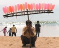 Sweet vendor on sea beach Royalty Free Stock Photo