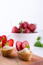 Sweet waffle basket with cream cheese and strawberries for summer breakfast Royalty Free Stock Photo
