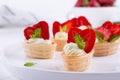 Sweet waffle basket with cream cheese and strawberries for summer breakfast Royalty Free Stock Photo