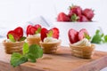 Sweet waffle basket with cream cheese and strawberries for summer breakfast Royalty Free Stock Photo