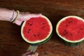 The sweet water-melon, the man cuts a water-melon, a knife in a water-melon. Royalty Free Stock Photo