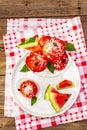 Sweet watermelon ice cream with coconut flakes and fresh basil leaves Royalty Free Stock Photo