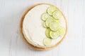 Sweet white buttercream cake with sliced lime on top