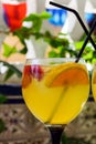 Sweet white sangria fruit in glass goblets on the table. Traditional spanish food. One glass on a table in a Spanish restaurant in Royalty Free Stock Photo