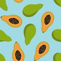 Sweet whole papaya and cut papaya tropical exotic fruit summer orange green with seeds on a blue background seamless pattern Royalty Free Stock Photo