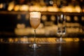 Sweet wine glass filled with delicious sour brandy crusta cocktail on the bar counter