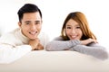 Sweet young couple sitting in sofa Royalty Free Stock Photo