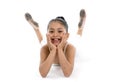 Sweet young cute ballet dancer girl posing on white background