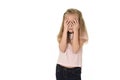 Sweet young little schoolgirl covering her face with her hands crying sad victim of bullying at school Royalty Free Stock Photo