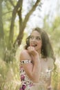 Sweat young woman eating cherry Royalty Free Stock Photo