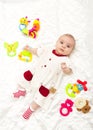 Sweetest baby girl playing with a colorful toy