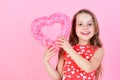 Sweetheart child with long hair smiling in red dress Royalty Free Stock Photo