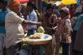 A sweetmeat seller sells sweets in a tribal fair in Chhattisgarh.