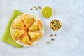 Sweets arabic dessert baklava, , kunafa, kadayif with pistachio and cheese . Top view, copy space Royalty Free Stock Photo