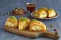 Sweets arabic dessert kunefe, kunafa, kadayif with pistachio and cheese Royalty Free Stock Photo