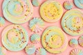 Sweets background with meringue swirls. Top view