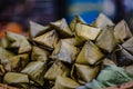 Sweets made from flour with soybean or coconut fillings wrapped in banana leaves and steamed, called Khanom Thien