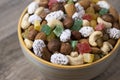 Sweets, raisin, candied fruit and nuts in a bowl on a table Royalty Free Stock Photo