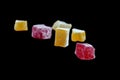 Sweets Turkish sweets on a black background. Isolated Candied