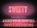 Sweety sign with narrow bold pink neon alphabet on brick wall background. Strawberry pink night light glowing effect