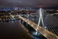 Swietokrzyski Bridge over the Vistula River with a panoramic view of the center of Warsaw at night. Poland Royalty Free Stock Photo