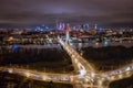 Swietokrzyski Bridge over the Vistula River with a panoramic view of the center of Warsaw at night. Poland Royalty Free Stock Photo