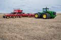 Swift Current, SK/Canada- May 4, 2019: Farmer, tractor and air drill seeding equipment in Saskatchewan, Canada