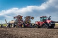 Swift Current, SK/Canada- May 15, 2020: Farmers consulting after loading seed and fertilizer into Bourgault air seeder in Sask Royalty Free Stock Photo