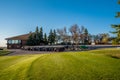 Swift Current, SK/Canada- May 14, 2020: Sunset over the first tee, carts and clubhouse at Elmwood Golf Course