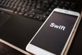 Swift Programming language for mobile development, concept. Smartphone Royalty Free Stock Photo