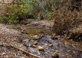 The swift, shallow, cold mountain Ayun river in the Galilee in northern Israel