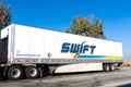 Swift sign, logo on the side of the trailer. Swift Transportation is a Phoenix, Arizona-based American truckload motor shipping