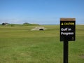 Swilken Bridge and a `Caution, Golf in Progress`-sign