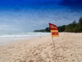 Swim here. Safety warning signs for tourists. At Surin beach mon Royalty Free Stock Photo