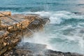 Swim ladder leading to stormy mystic sea Royalty Free Stock Photo