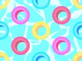 Swim ring seamless pattern. Inflatable pool rings, top view. Multi-colored inflatable circles for swimming on the water. Design