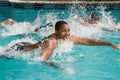 Swim to win in family Royalty Free Stock Photo