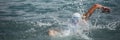 Swim triathlete man swimming freestyle crawl in ocean Royalty Free Stock Photo