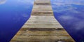 Swim wooden raft floating dock wood pontoon on blue sky reflection effect in mirror image